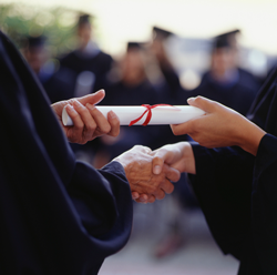 Graduate receiving diploma